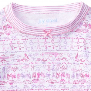 Close-up of Joy Street ballet two-piece pajamas showcasing a pink ballet-themed print and scoop neckline