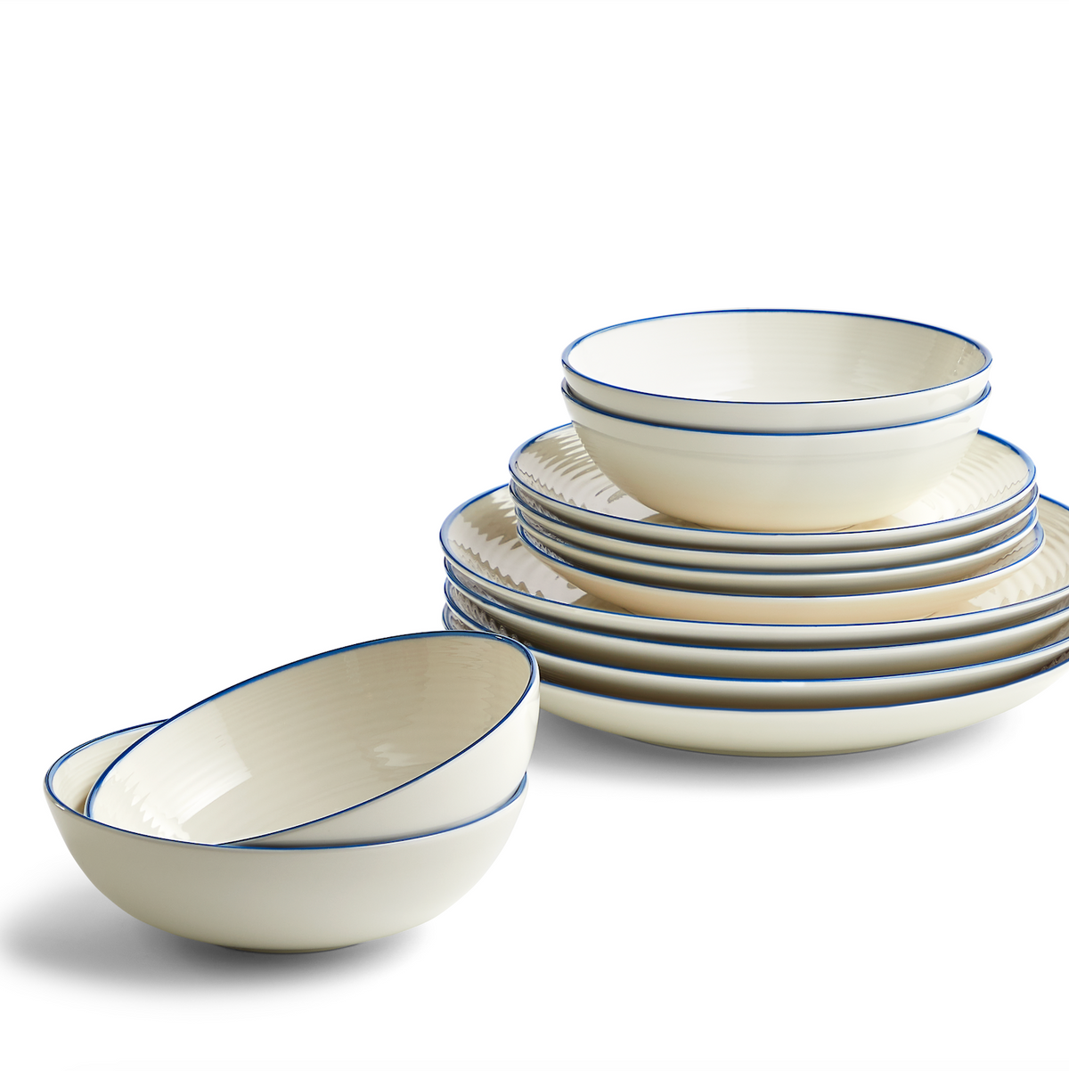 Angled view of Gordon Ramsay Maze Denim Line 12 Piece Dinner Set showcasing white stoneware and blue trim on white background
