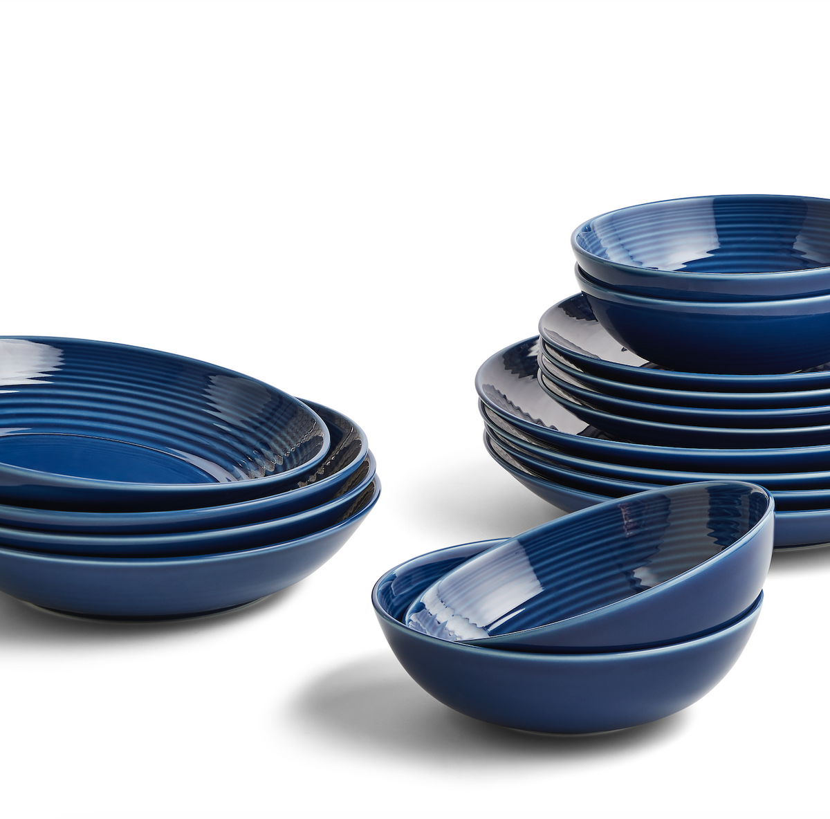 Front view of Gordon Ramsay Maze Denim 16 Piece Dinner Set showcasing circular design and blue glaze on white background