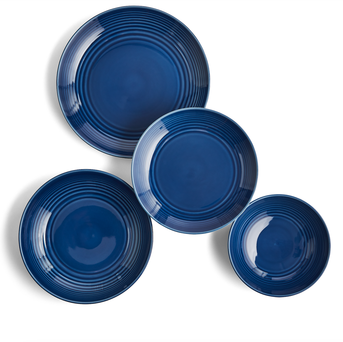 Front view of Gordon Ramsay Maze Denim 16 Piece Dinner Set showcasing blue stoneware with circular Maze design on white background