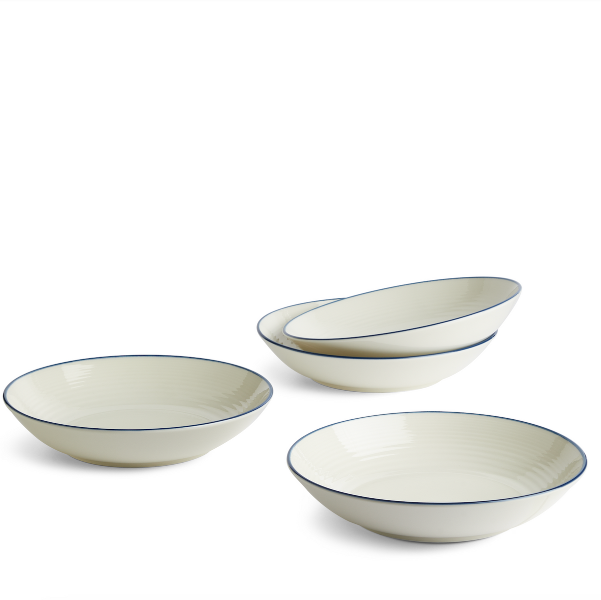 Front view of four Gordon Ramsay Maze Denim Line pasta bowls showcasing white stoneware, blue trim, and circular Maze design