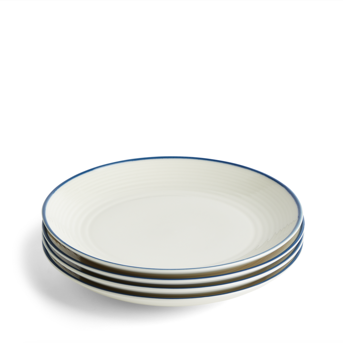 Front view of Gordon Ramsay Maze plate set of four showcasing white stoneware and blue denim rim on white background