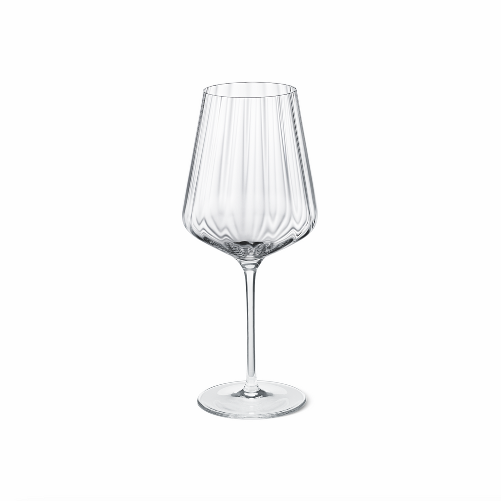 Front view of Bernadotte white wine glass showcasing vertical fluted grooves and a long slender stem on a white background