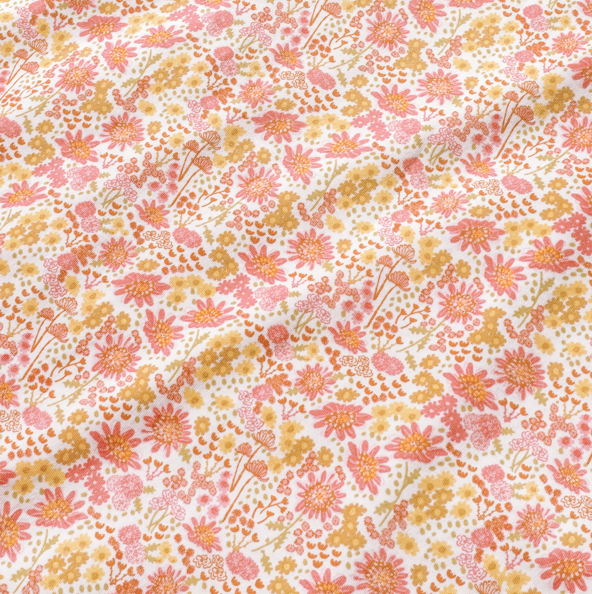 Close-up of Marigolds Girls Puff Sleeve Baby Onesie showcasing a pink and orange floral pattern on white