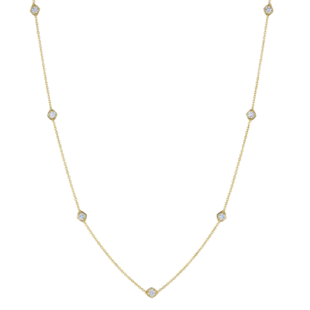 The Small Serpentine Station Necklace features hexagon bezel set diamonds in a delicate white gold design, shown on a plain white background.