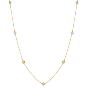 The Small Serpentine Station Necklace features hexagon bezel set diamonds in a delicate white gold design, shown on a plain white background.