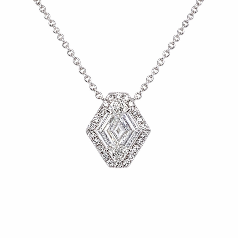 The North-South Shield Diamond Necklace with Pavé Halo in white gold features an 18-inch silver chain and a hexagon-shaped pendant adorned with clear gemstones and a pavé halo of sparkling round stones.
