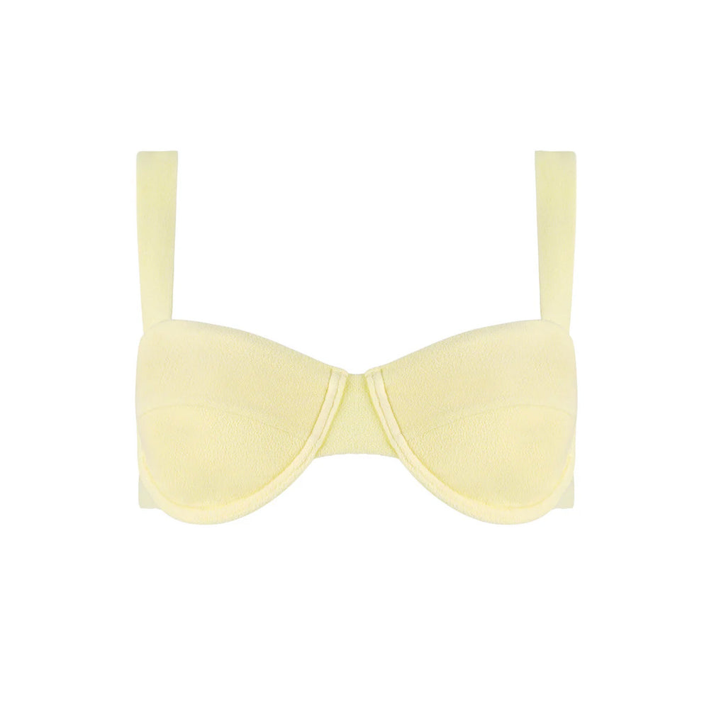Front view of Banana Terry cup bikini top showcasing molded cups and terry fabric in pale yellow on white background