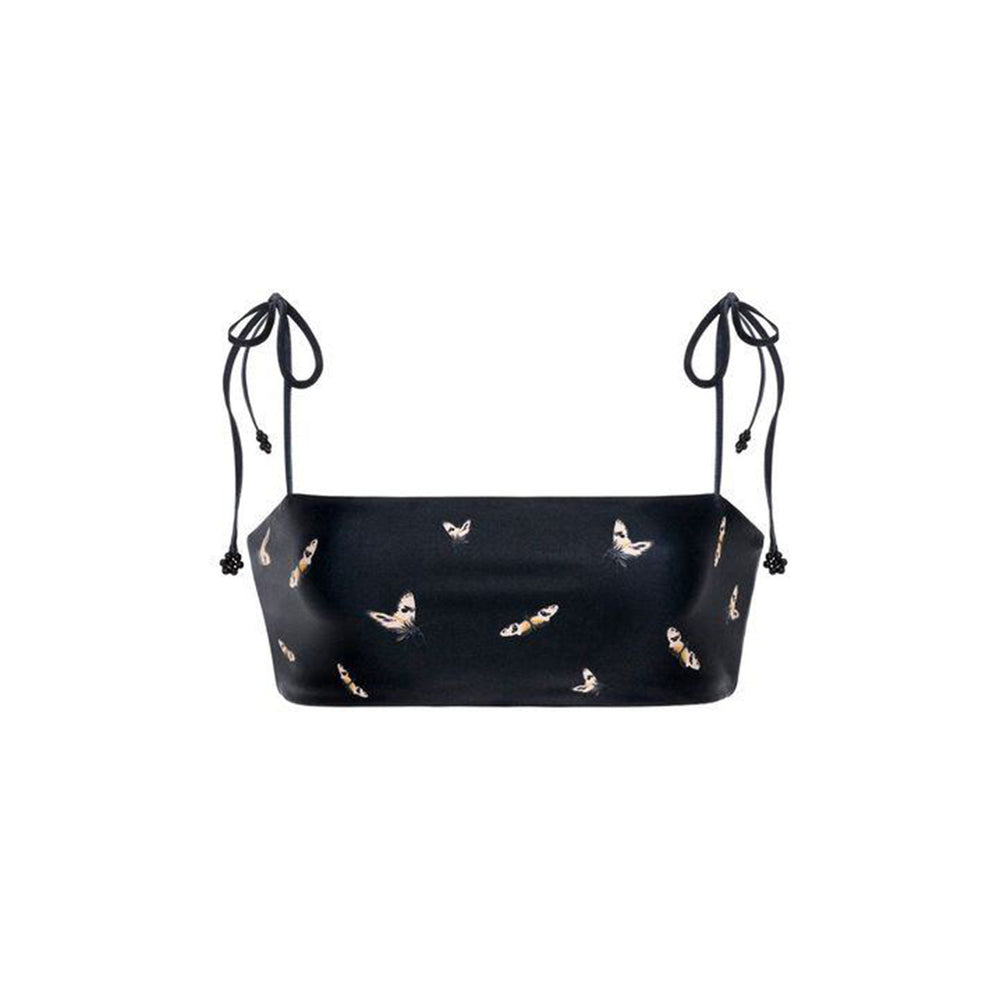 Front view of Primavera Azucar bikini top, black bandeau with tie shoulder straps and small butterfly print on white background