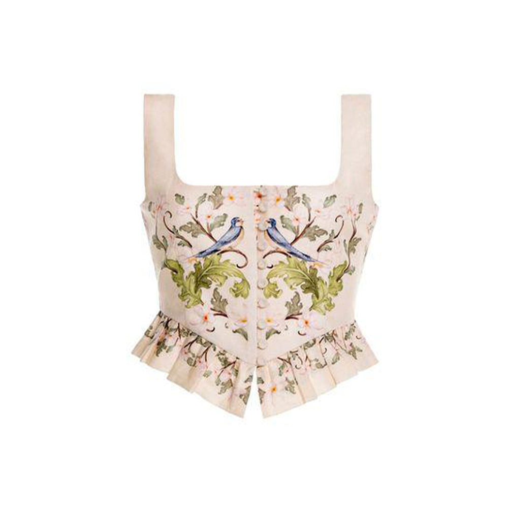 Front view of Eslabon Anhelo Top with embroidered blue birds and floral print, square neckline and ruffled peplum