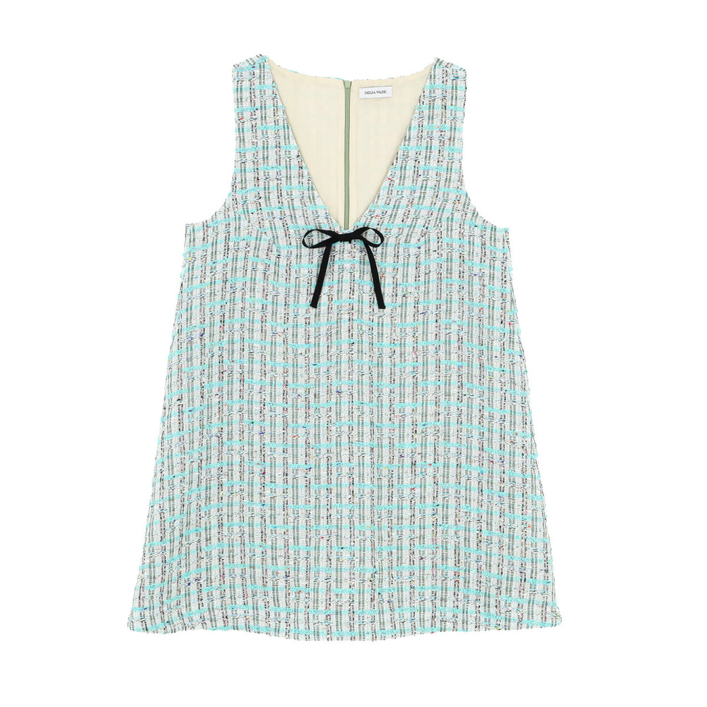 Front view of Liza dress in verdure tweed showcasing V-neck with black ribbon tie and back zipper on white background