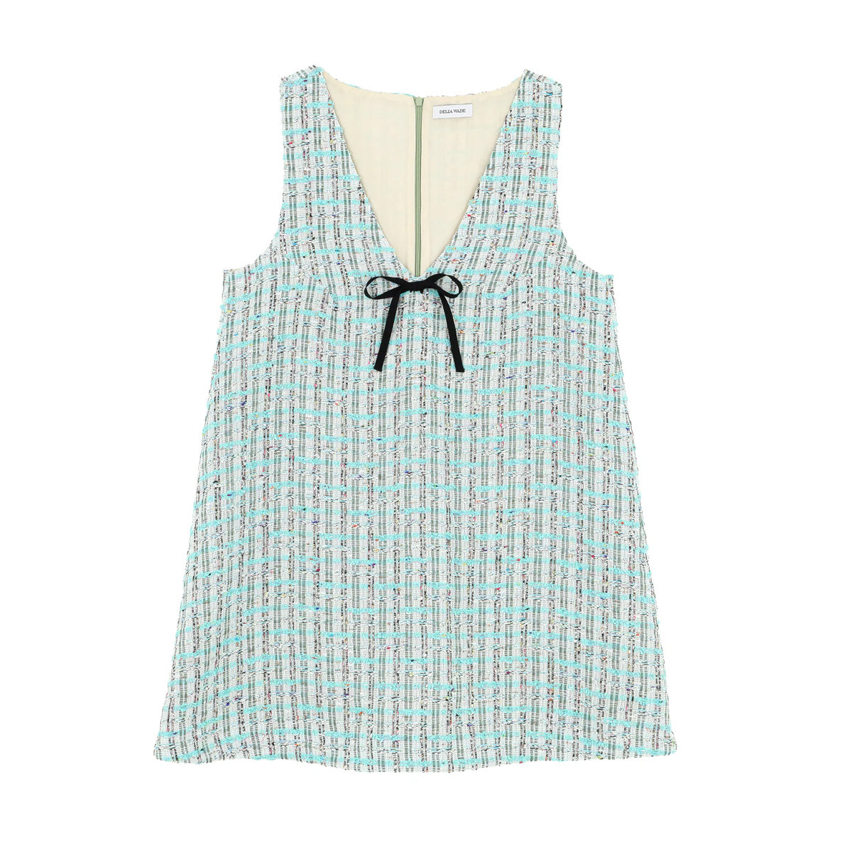 Front view of Liza dress in verdure tweed showcasing V-neck with black ribbon tie and back zipper on white background