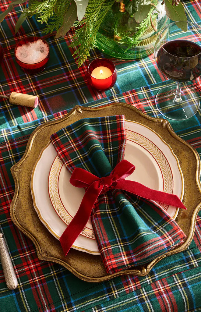 Close-up of Signature Twill Napkins in Kensington Tartan showcasing colorful plaid on a festive table setting