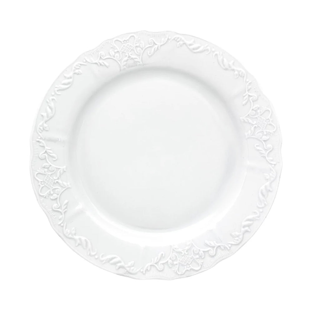Top view of Simply Anna dinner plate showing embossed French relief border on white porcelain against a white background