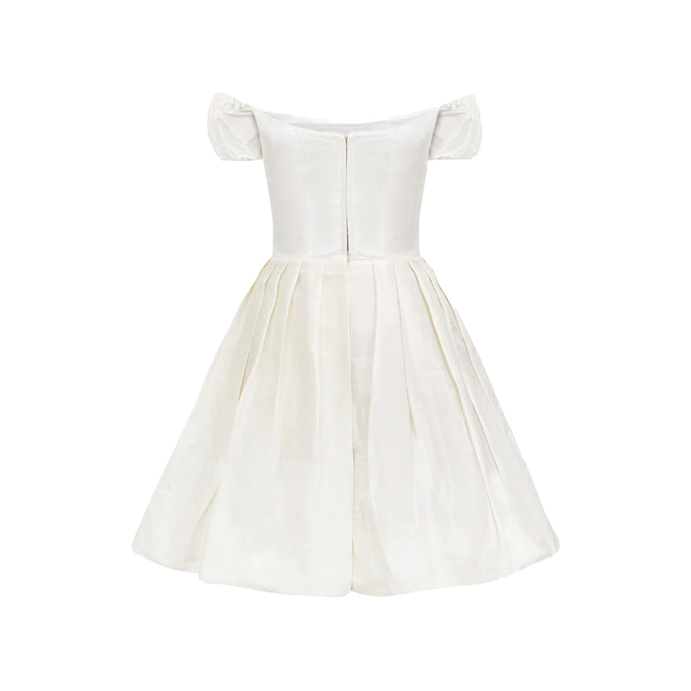 Back view of Sissi Silk Taffeta Dress in White showcasing an off-shoulder neckline, puff sleeves, and pleated skirt