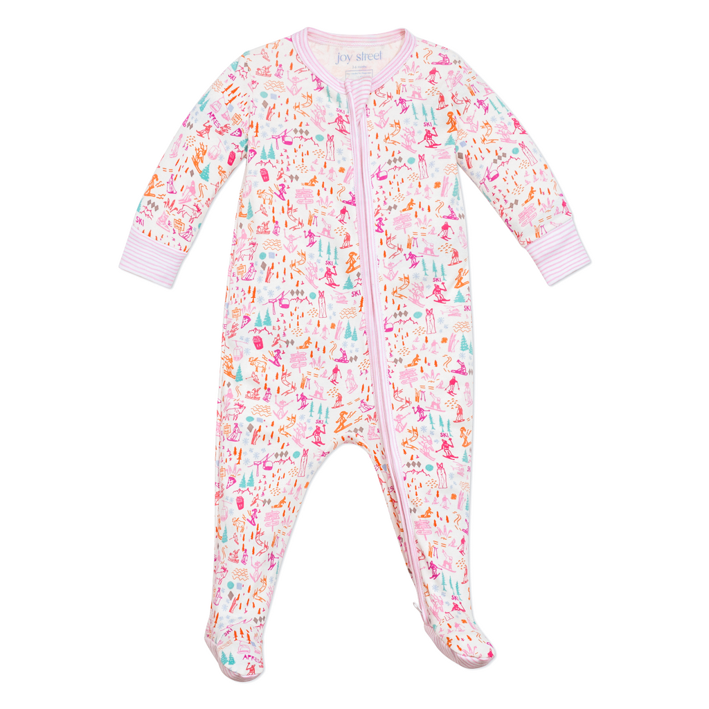 Front view of pink Après Ski Zip baby onesie with colorful ski print, pink stripe trim, and two-way zip on white background