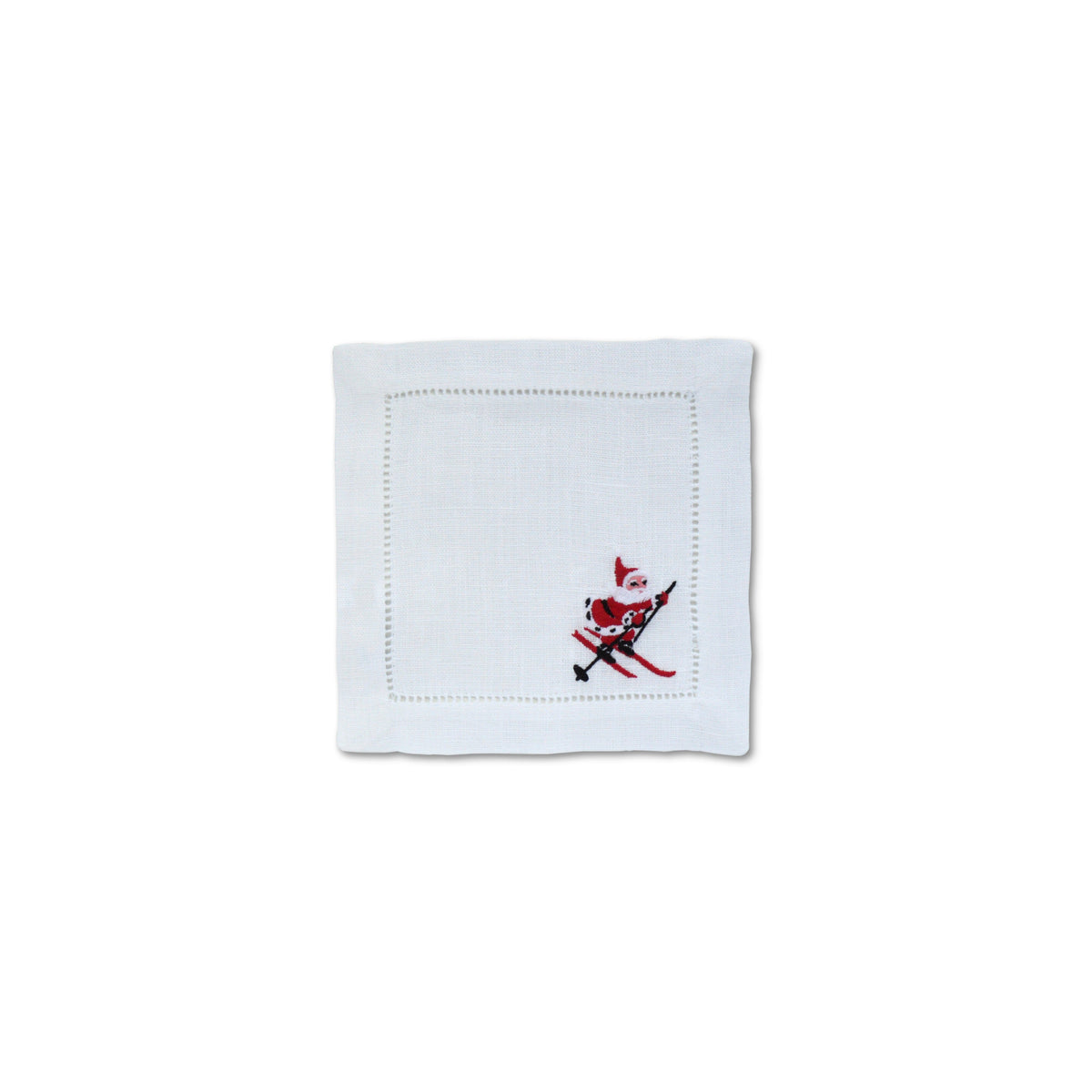 Front view of Skiing Santa Cocktail Napkins Set of 4 showcasing an embroidered Santa skiing on white linen