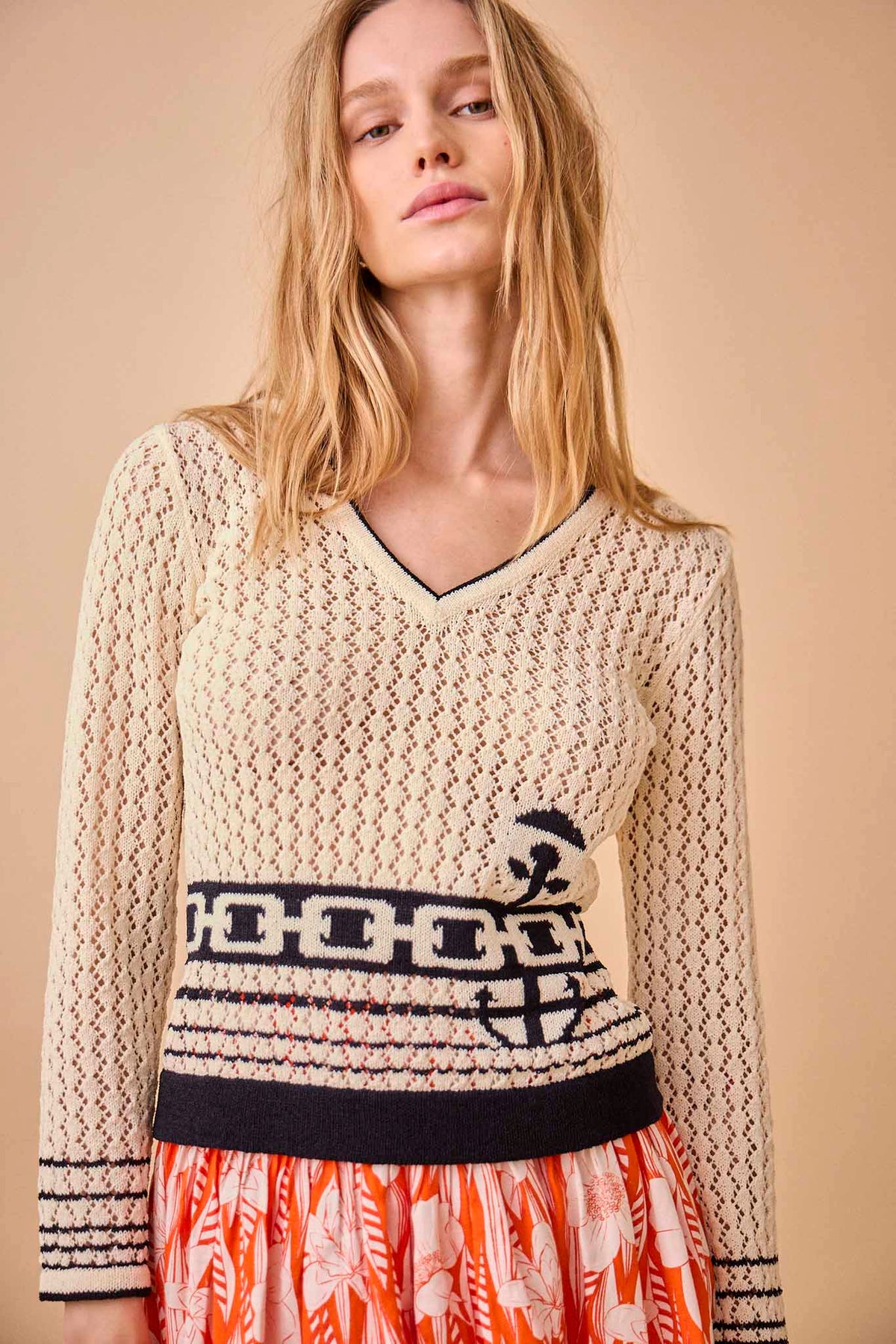 The Skylar sweater has a flattering v-neckline, a slim fit with anchor and stripe trim detailing.