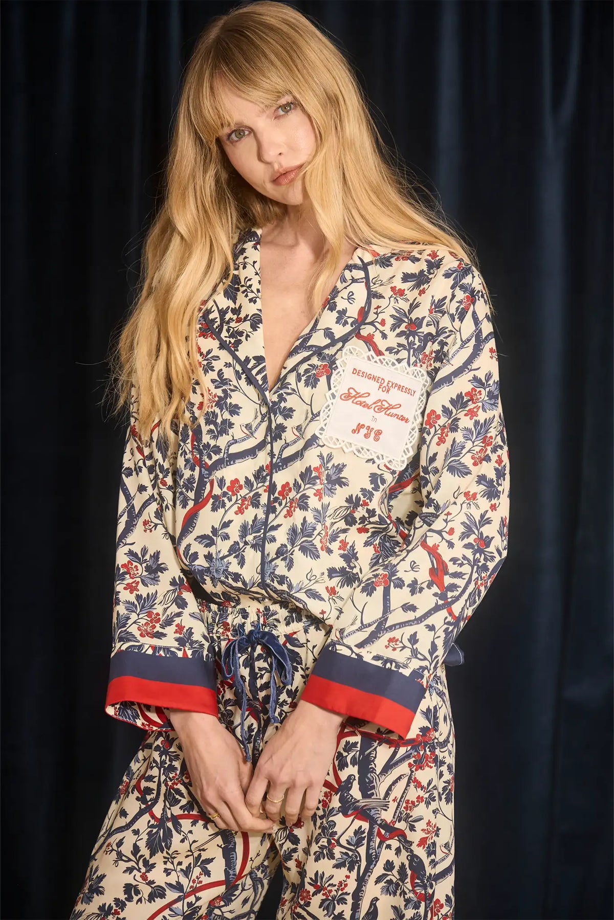 Pajama set with a long sleeve collared button front shirt and an elastic waist pull on pant.