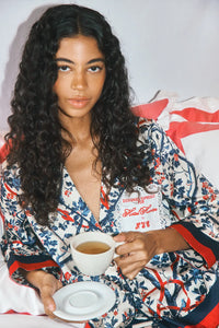 Pajama set with a long sleeve collared button front shirt and an elastic waist pull on pant.