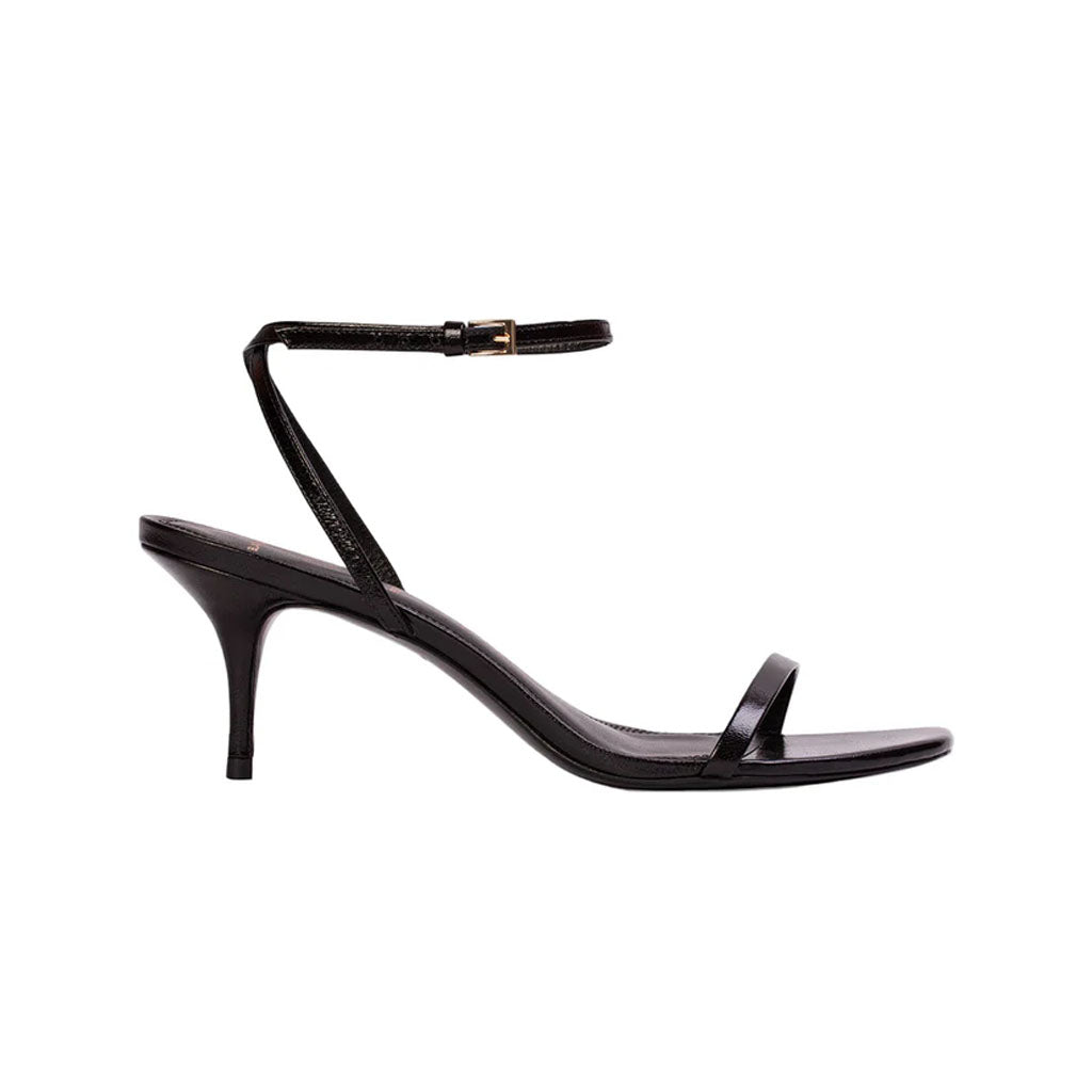 Side view of Slone 65 in Black Leather sandal showcasing angled snip-toe, ankle strap, and curved mid-height heel on white background