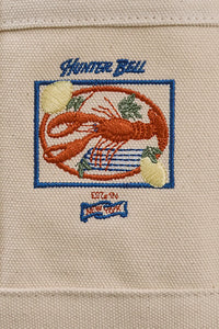 Close up of the front of the small canvas tote bag 