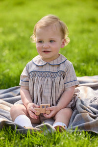 Little English classic children's clothing.  Smocked peter pan bubble in tan and blue Durham windowpane with blue piping for baby boys