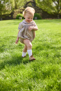 Little English classic children's clothing.  Smocked peter pan bubble in tan and blue Durham windowpane with blue piping for baby boys