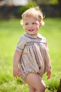 Little English classic children's clothing.  Smocked peter pan bubble in tan and blue Durham windowpane with blue piping for baby boys