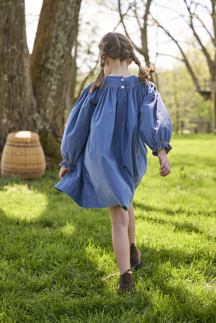Little English traditional children's clothing.  Long sleeve stormy blue corduroy dress with flying mallard collar around the neckline for little girls.