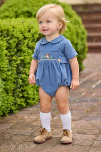 Little English classic children's clothing.  Baby boys stormy blue corduroy peter pan bubble with button tabs and flying mallard smocking across the chest.