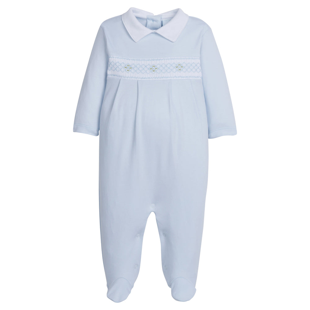 little english baby boy smocked footie with blue geo design and white polo collar