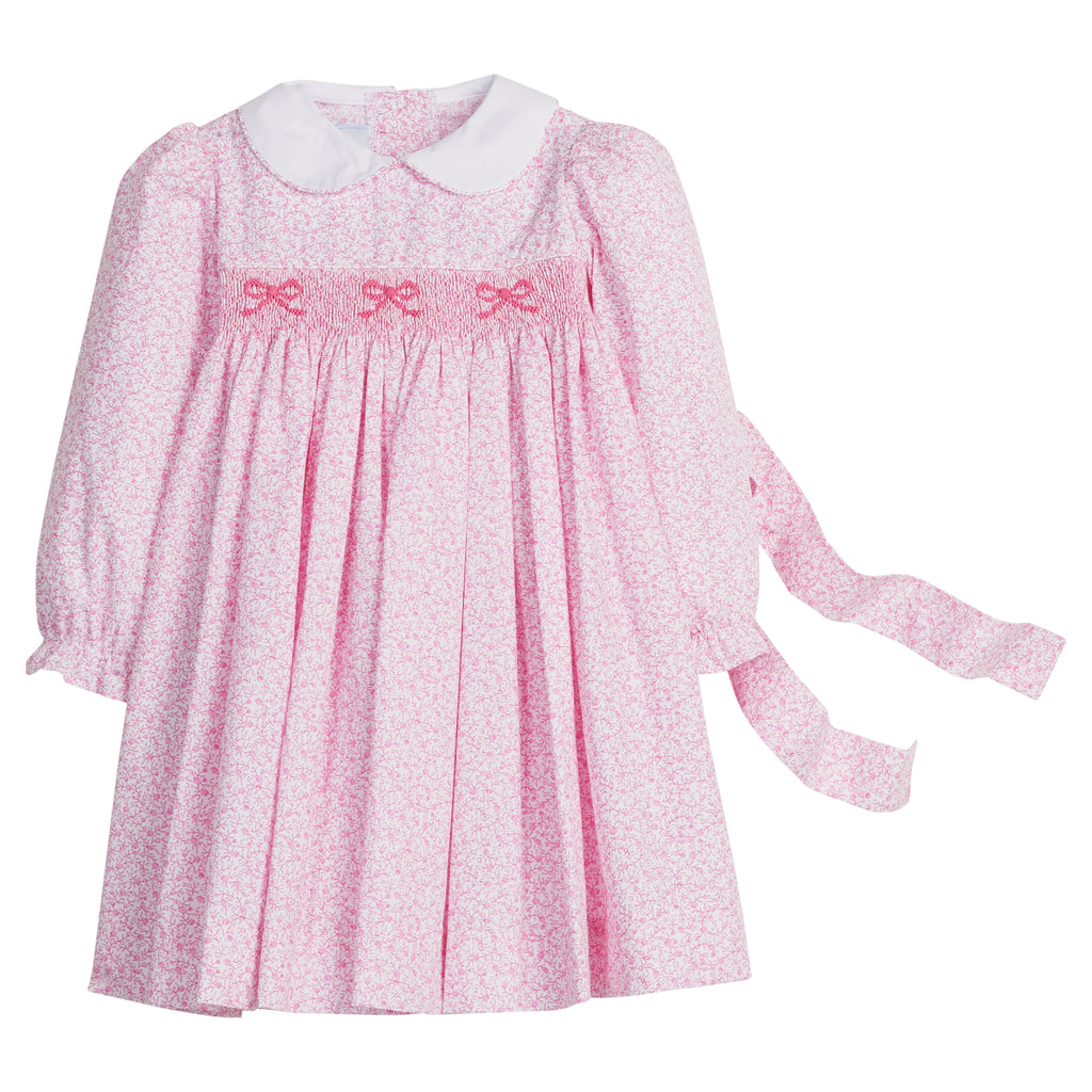 little english classic children's clothing girls pink and white floral long sleeve dress with peter pan collar, chest smocking, and bow embroidery for fall 