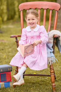 little english classic children's clothing girls pink and white floral long sleeve dress with peter pan collar, chest smocking, and bow embroidery for fall 