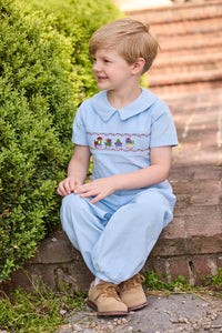 Little English traditional children's clothing. Boys blue corduroy set - banded pants paired with Eaton collar short sleeve top with holiday train smocking across the chest.