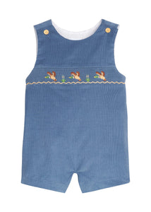 Little English traditional children's clothing for toddler boys, stormy blue corduroy john john with flying mallard smocking across chest. 
