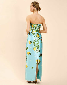 Solstice Gown in Sorrento Citrus poly silk twill with strapless neckline, removable bow, convertible bodice, and side pockets.