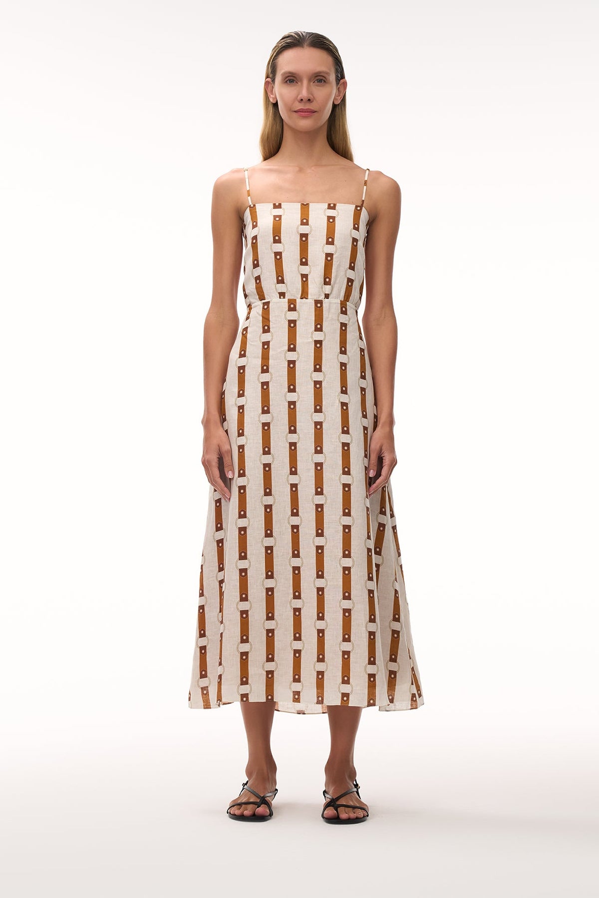 Front view of Nativa linen midi dress showcasing Horse Reins print, straight neckline, thin straps and cinched waist on white background