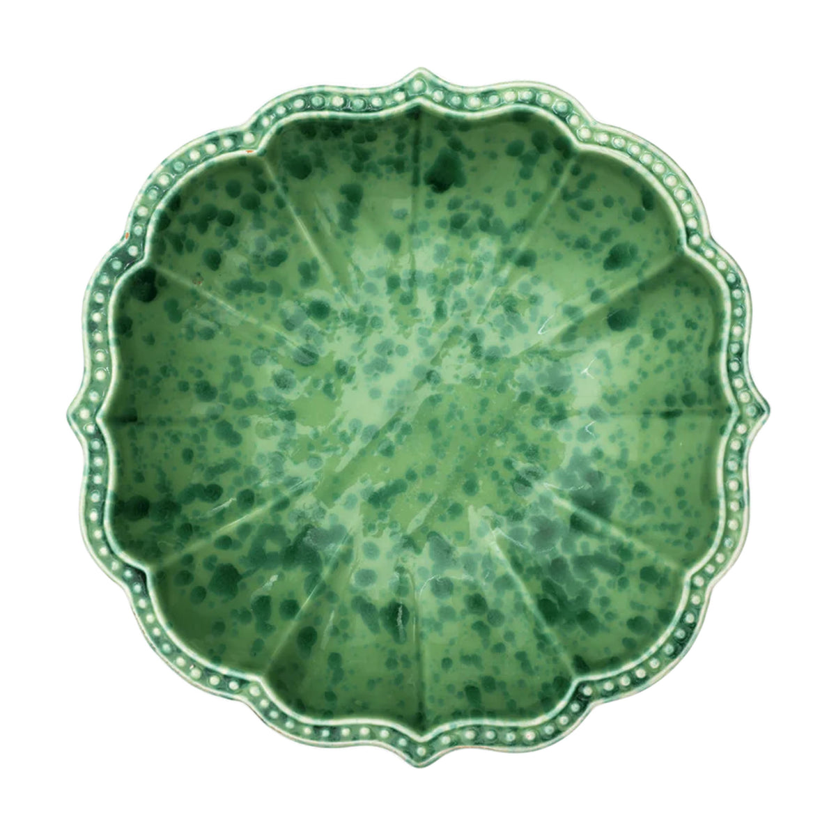 Top view of Speckled Serving Bowl in Green showcasing hand-painted speckled ceramic and scalloped rim on a white background