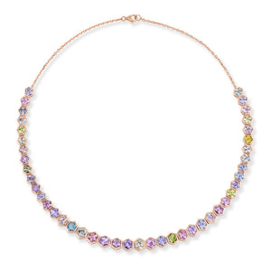 The Spectrum Collar Necklace in Rose Gold features bezel-set multicolor hexagonal sapphires—purple, blue, green, yellow, and pink—in a beautifully symmetrical design.