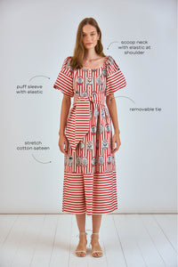 The Lucy midi dress has a square scoop neck, puff sleeves, front button placket, and a self belt.