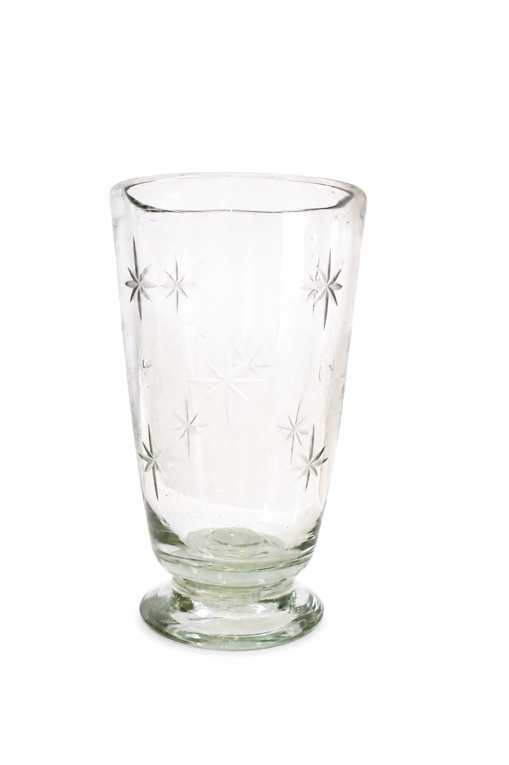 Front view of Star-Etched Glassware in Clear, Set of 4, showcasing hand-etched star design and footed silhouette