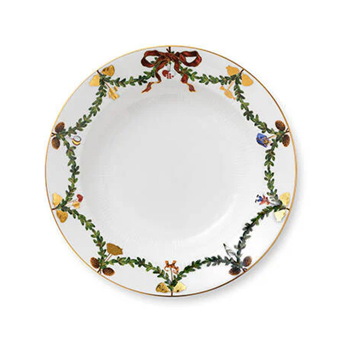 Top view of Star Fluted Christmas Rim soup bowl showing green garland and pinecone and bell motifs with gold trim on white porcelain