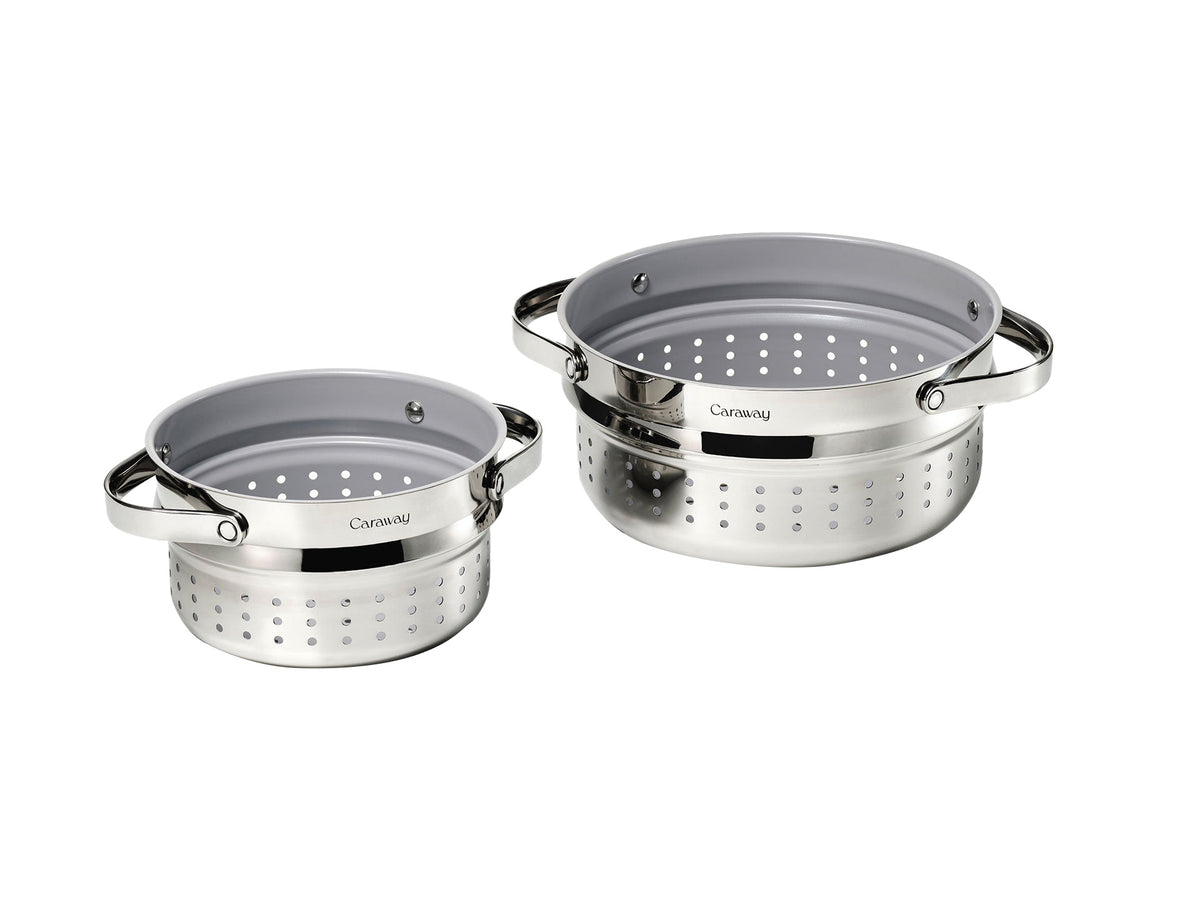 Front view of Steamer Duo stainless steel steamers, two nesting sizes with perforated sides and ceramic-coated interiors