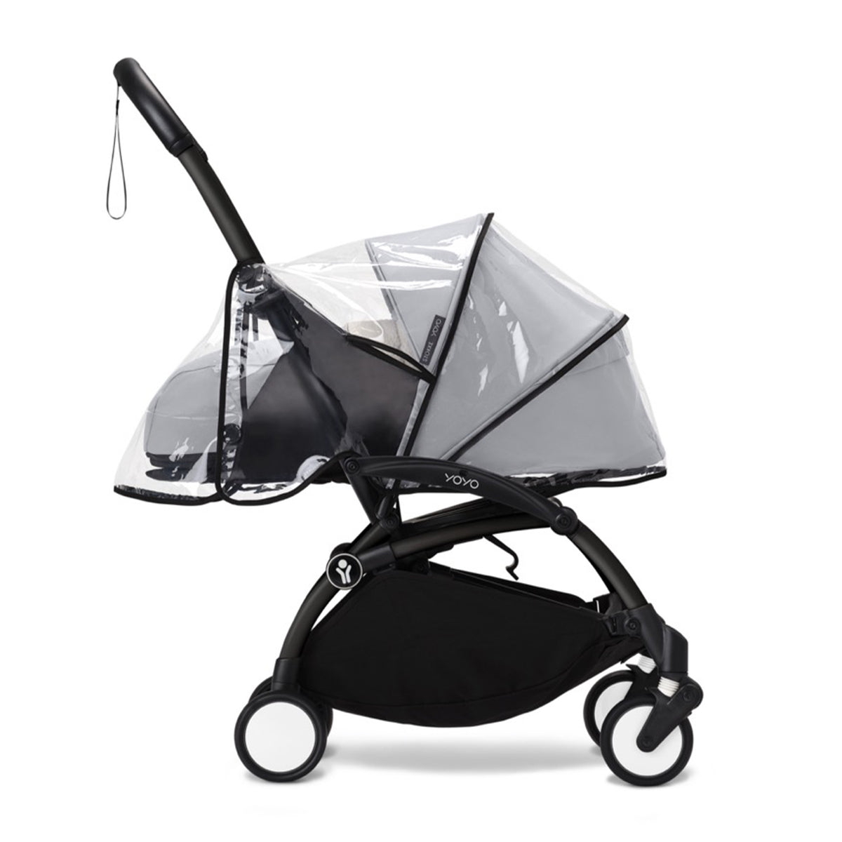 Side view of YOYO stroller with 0+ Newborn Pack fitted with transparent rain cover with black trim on a white background