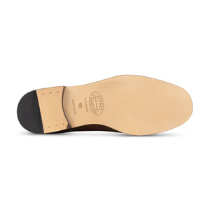 Our Flock Espresso Suede Slipper (Men) item is photographed here against a white background.