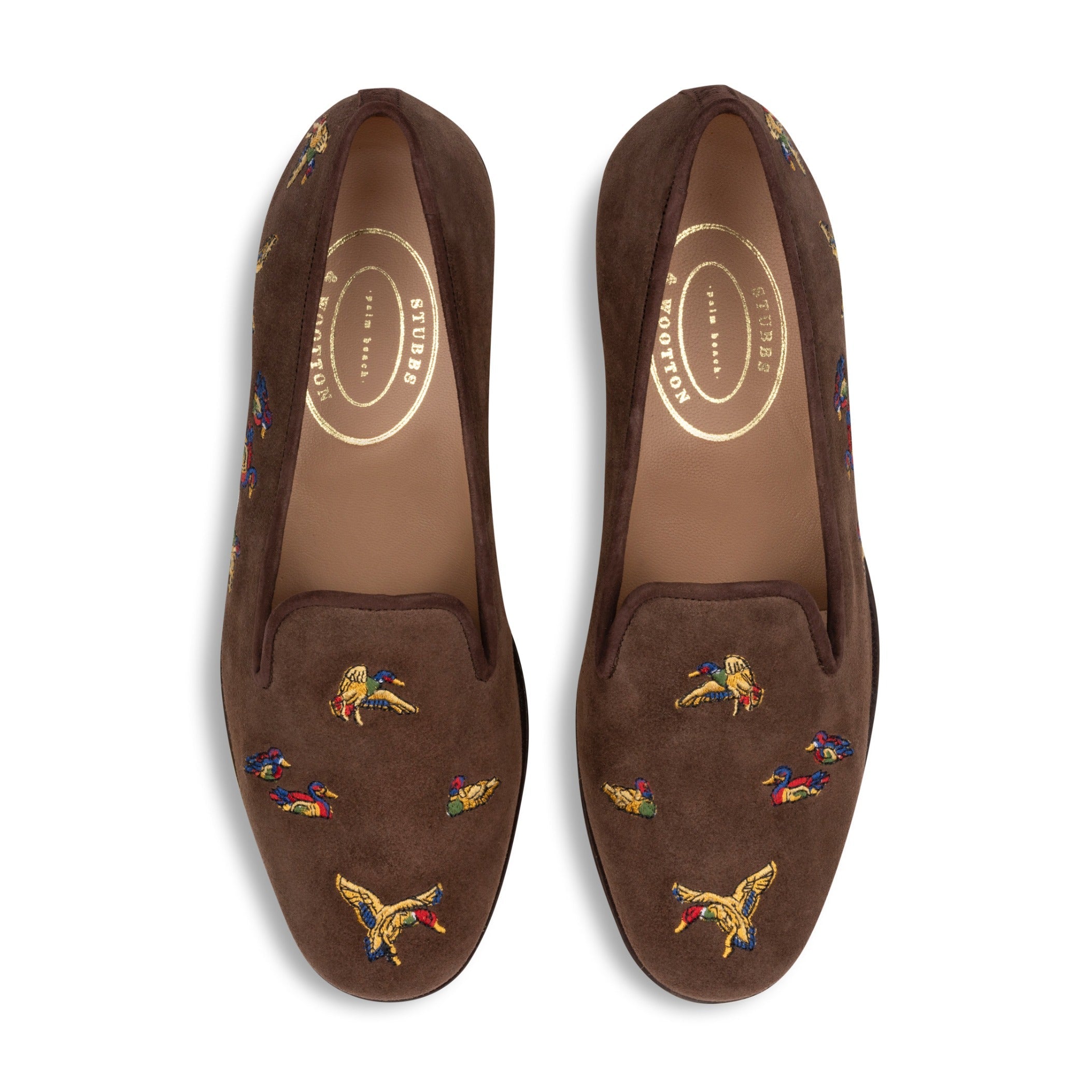 Our Flock Espresso Suede Slipper (Men) item is photographed here against a white background.