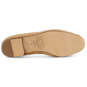 Bottom view of Teddy Oatmeal Boucle Slipper showcasing the leather sole and stacked wooden heel against a white background