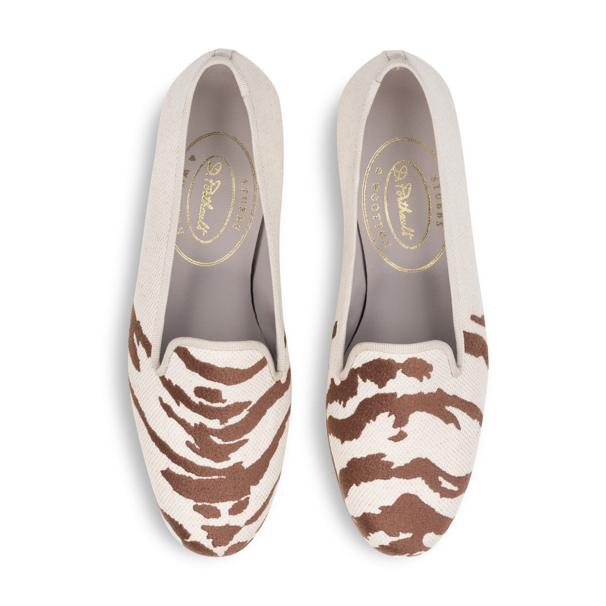 Top-down view of Tigre Espresso linen slipper showcasing brown tiger embroidery on cream linen with white background