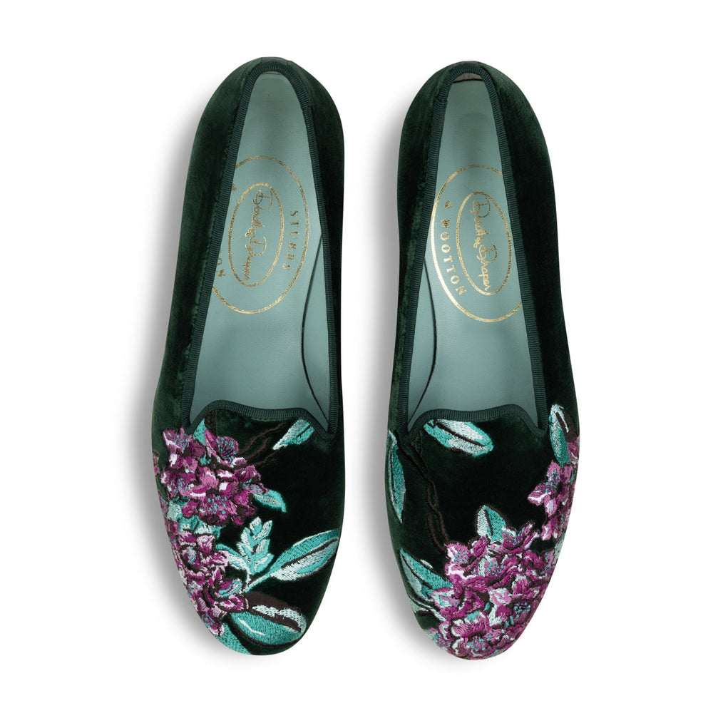 Top view of Rhododendron Hunter velvet slipper showcasing pink and teal rhododendron embroidery on dark green velvet
